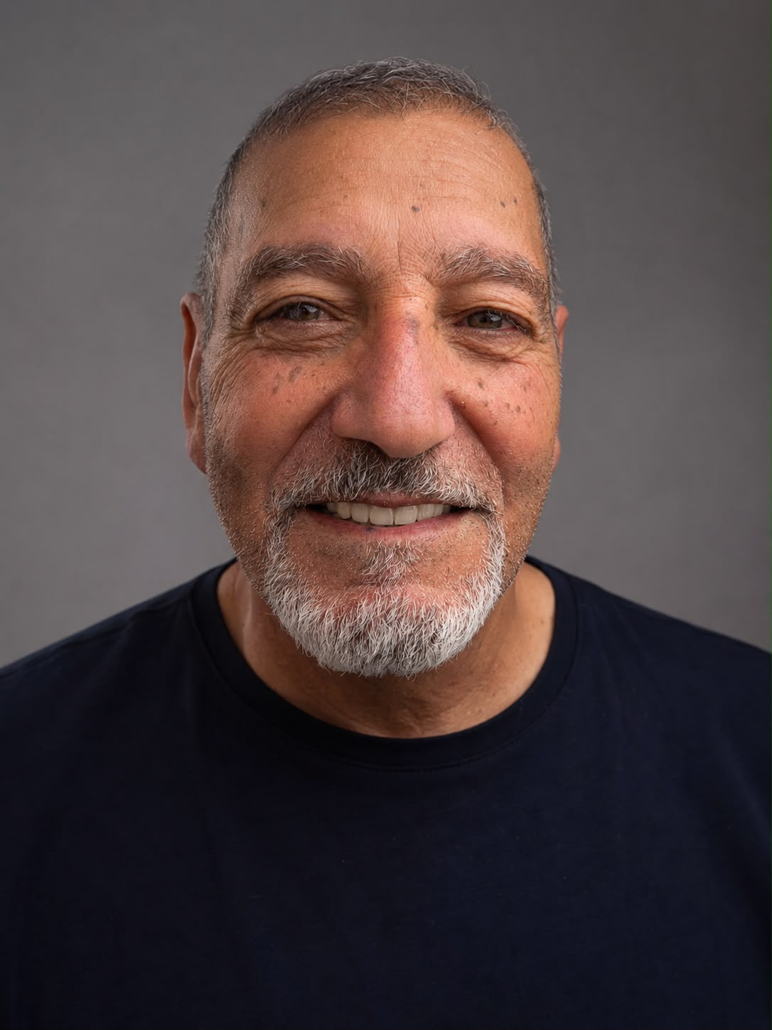 Happy patient showing his restored smile